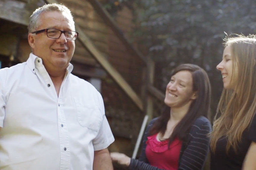 Stroke survivor enjoying life at home with friends and family.